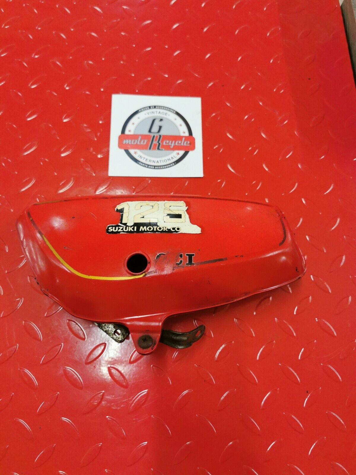 Suzuki TC125 1976 left side cover panel fairing