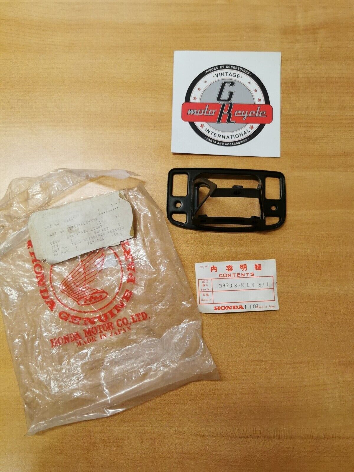 NOS HONDA XL250 1984 - 1987 BRACKET  TAILLIGHT  33713-KL4-671 H17