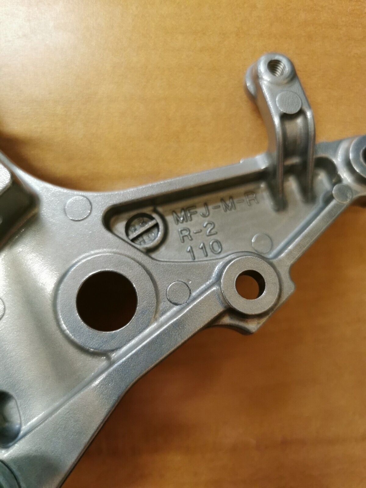 NOS HONDA    CBR600RR 2008 - 2022   MAIN STEP HOLDER 50600-MFJ-D00  H29