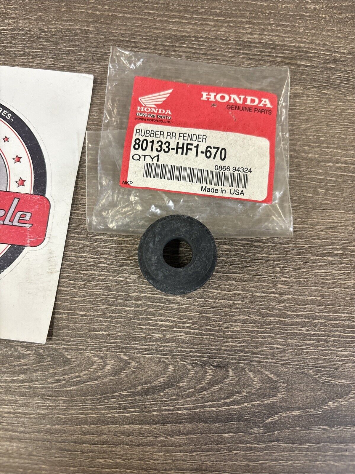NOS Honda TRX200 D REAR FENDER RUBBER 80133-HF1-670 H134