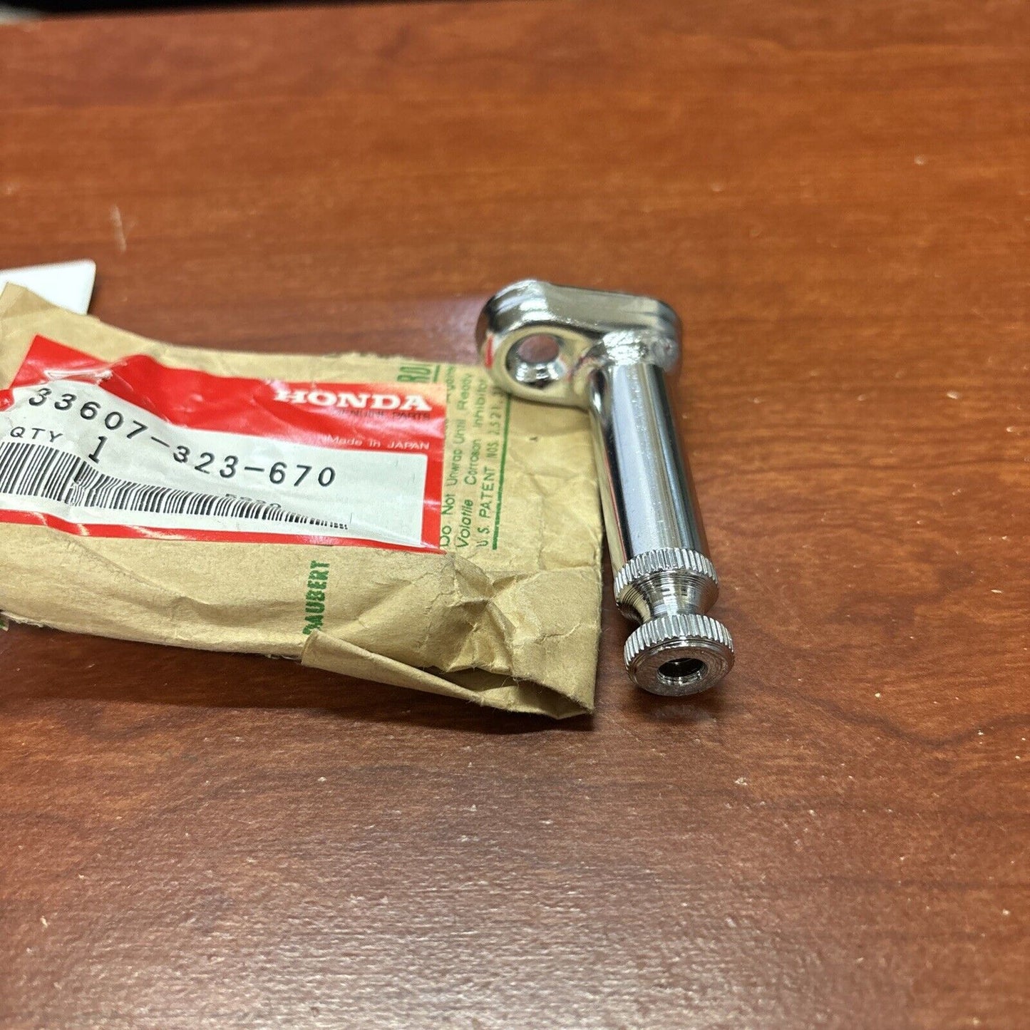 NOS Honda CB360P CB500 CB750 XL125 K0-K1 REAR WINKER STAY 33607-323-670 H165