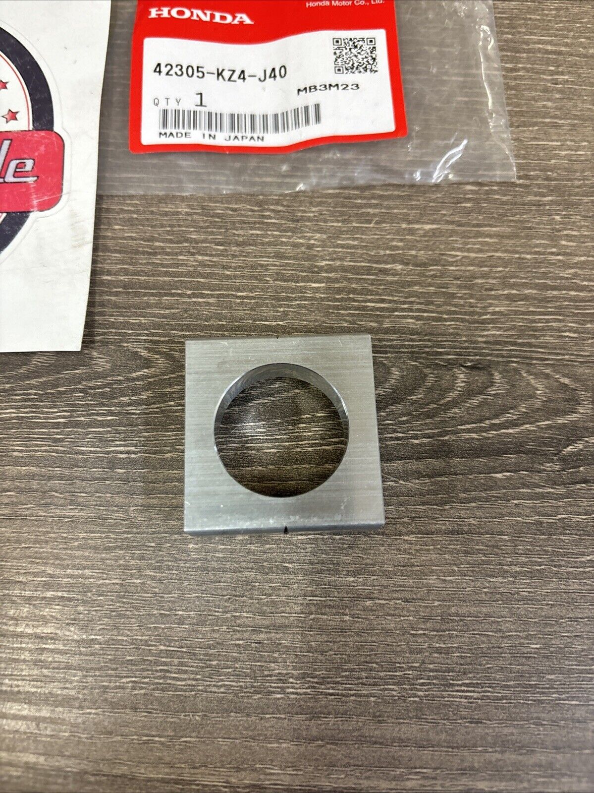 NOS Honda CR125R CR250R CRF250R CRF250X LEFT REAR AXLE COLLAR 42305-KZ4-J40 H138