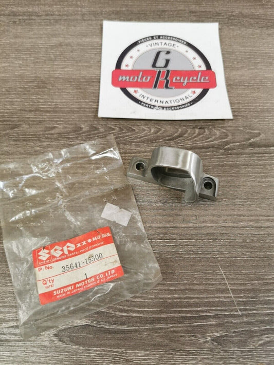 NOS SUZUKI GR650 1983 BRACKET REAR LH 35641-15500 S23