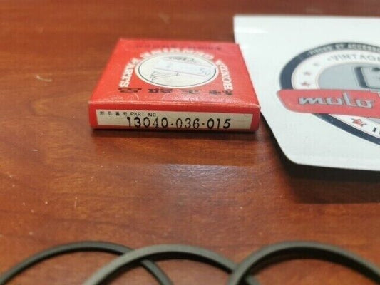 NOS Honda C50Z CD50 Z50 PISTON RING SET 0.75 13040-036-015 H78