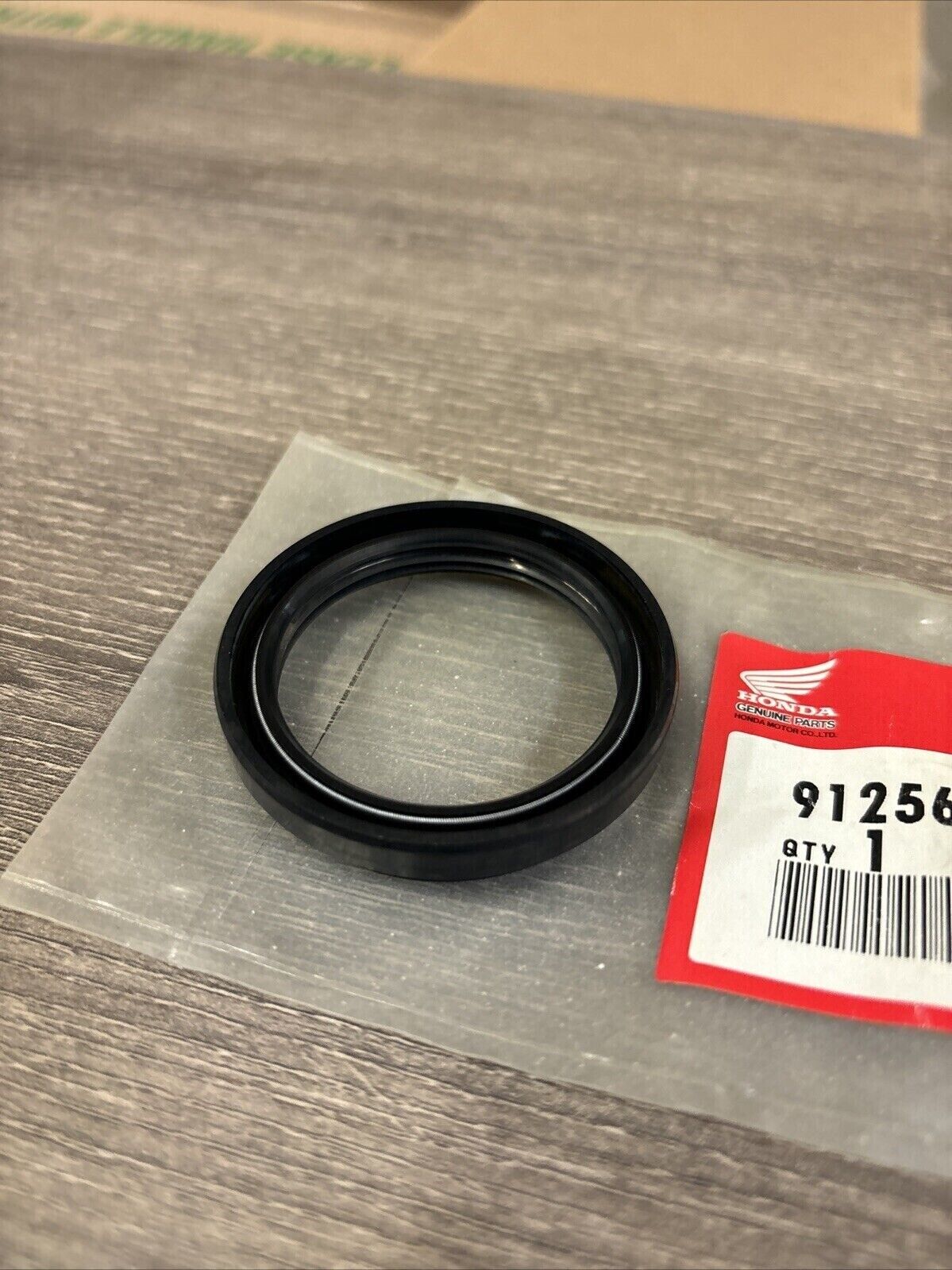 NOS Honda TRX350 TRX350D DUST SEAL 42X54X7 91256-HA7-771 H124
