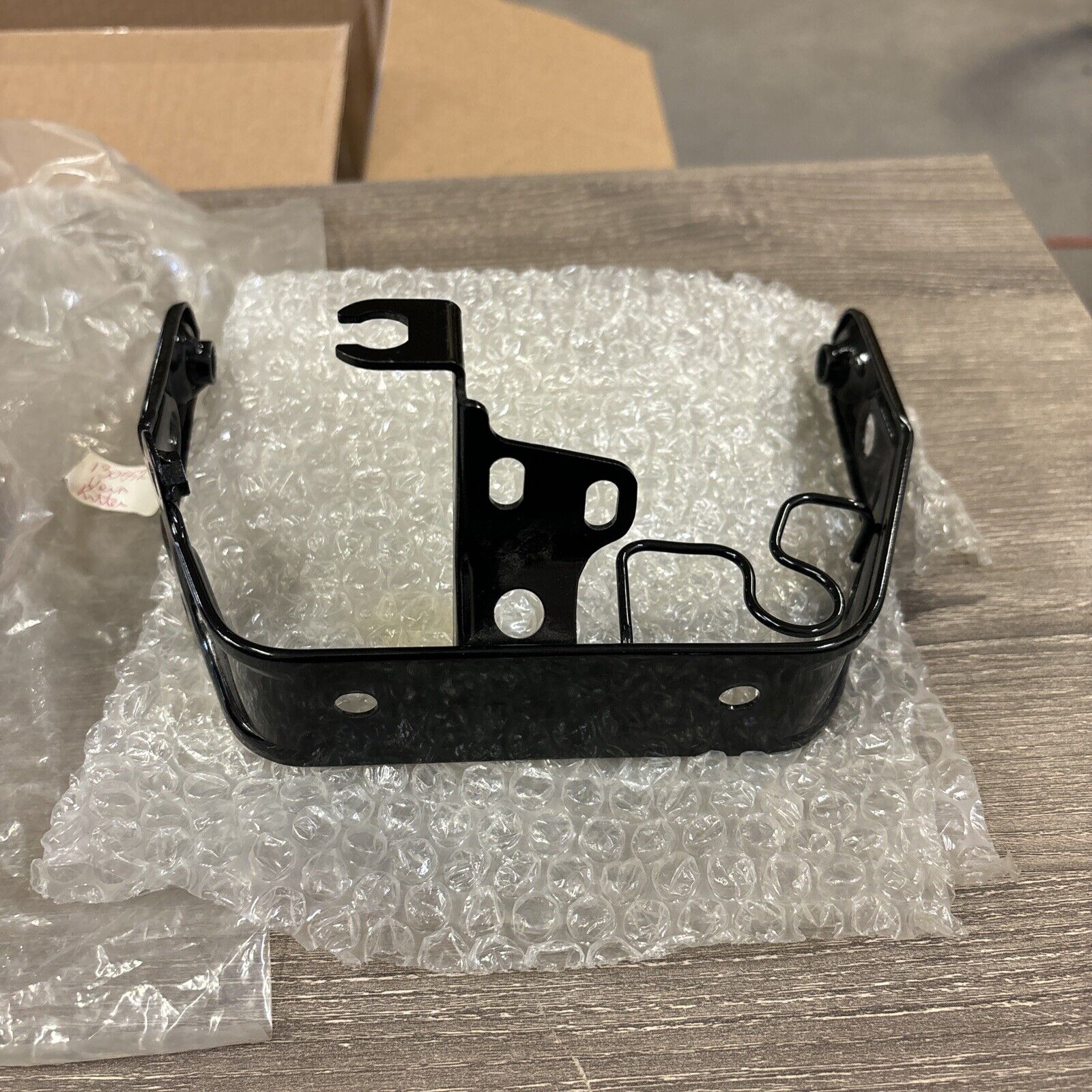NOS Honda 1986 - 1987 TRX200SX HEADLIGHT BRACKET 61311-HB3-770 H114