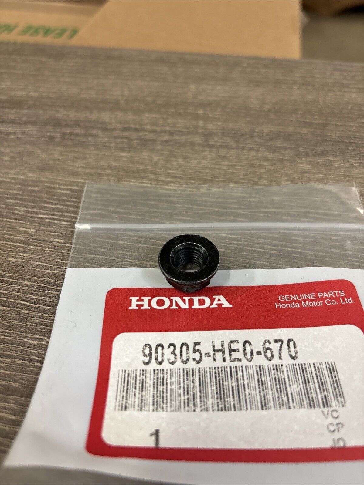 NOS Honda 1990 FL400R SELF-LOCK NUT 10MM 90305-HE0-670 H125