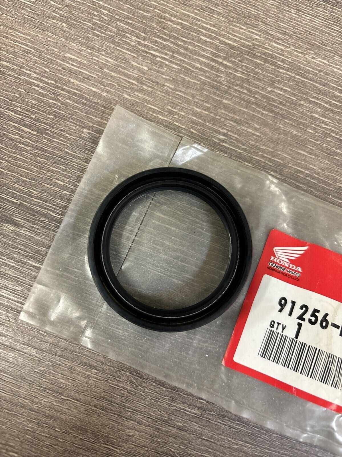 NOS Honda TRX350 TRX350D DUST SEAL 42X54X7 91256-HA7-771 H124