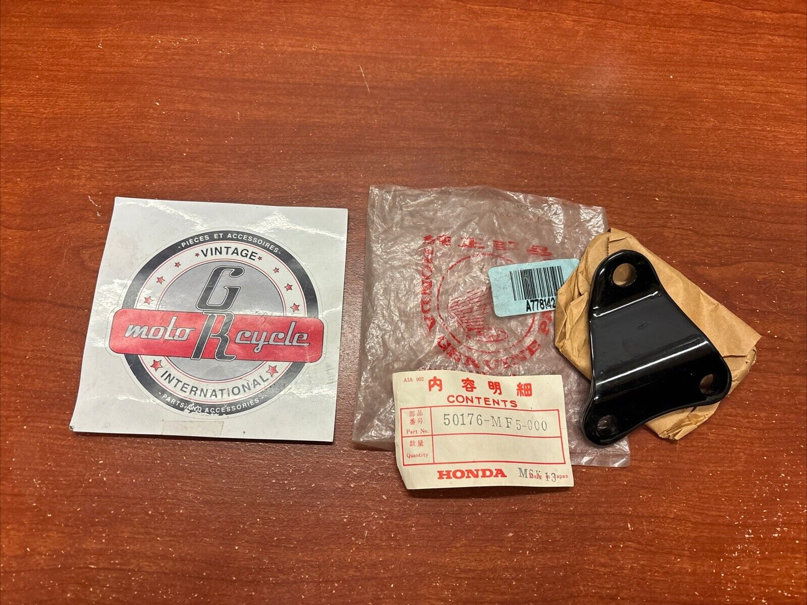 NOS Honda VT500C VT500FT LEFT FRONT ENGINE HANGER BRACKET 50176-MF5-000 H170