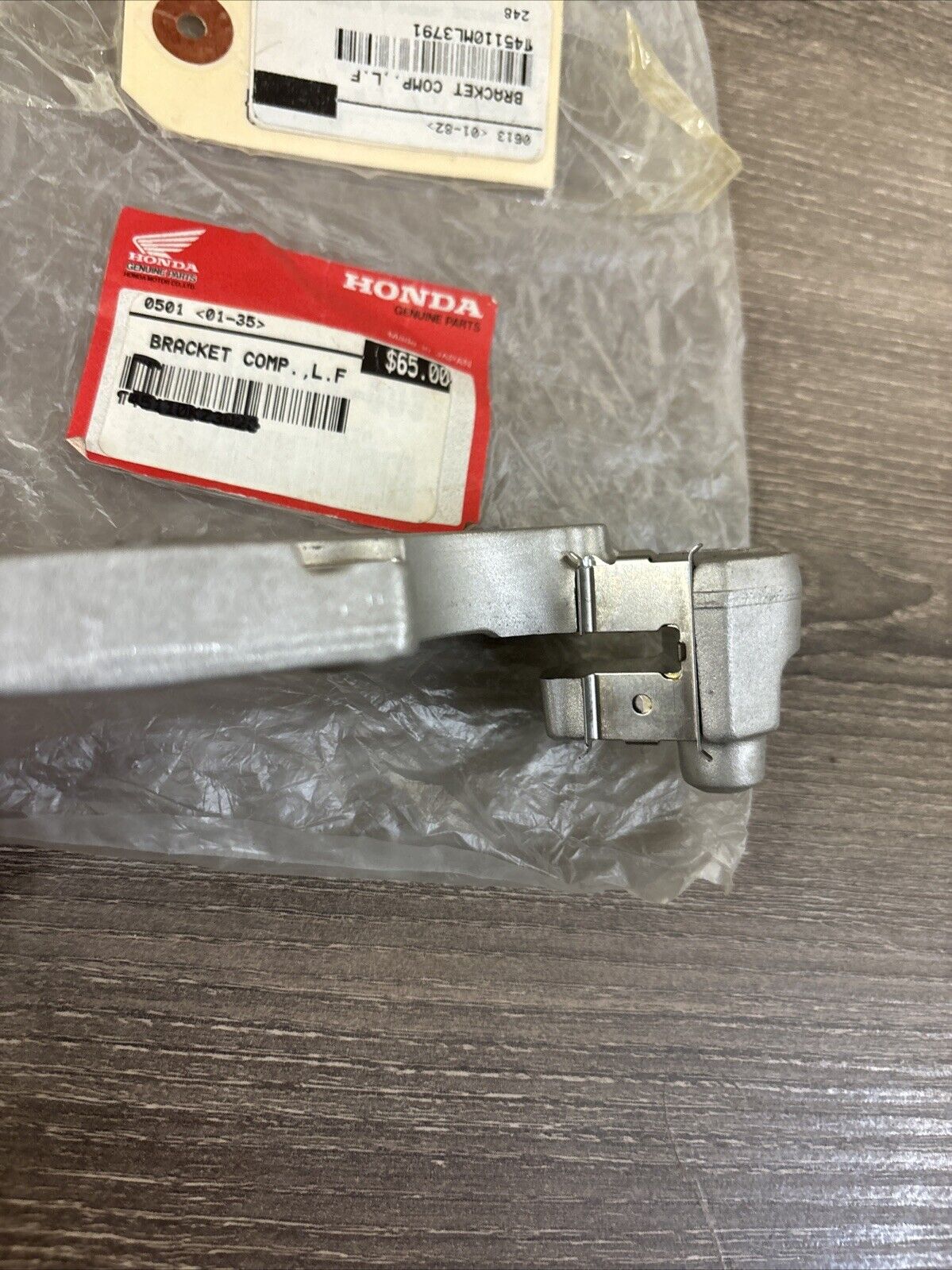 NOS Honda CR125R CR250R CR500R LEFT FRONT BRACKET 45110-KZ3-026 H120