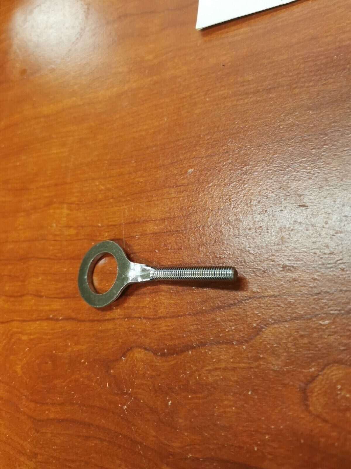 NOS Yamaha REAR WHEEL CHAIN PULLER 1 127-25388-01-00 Y69