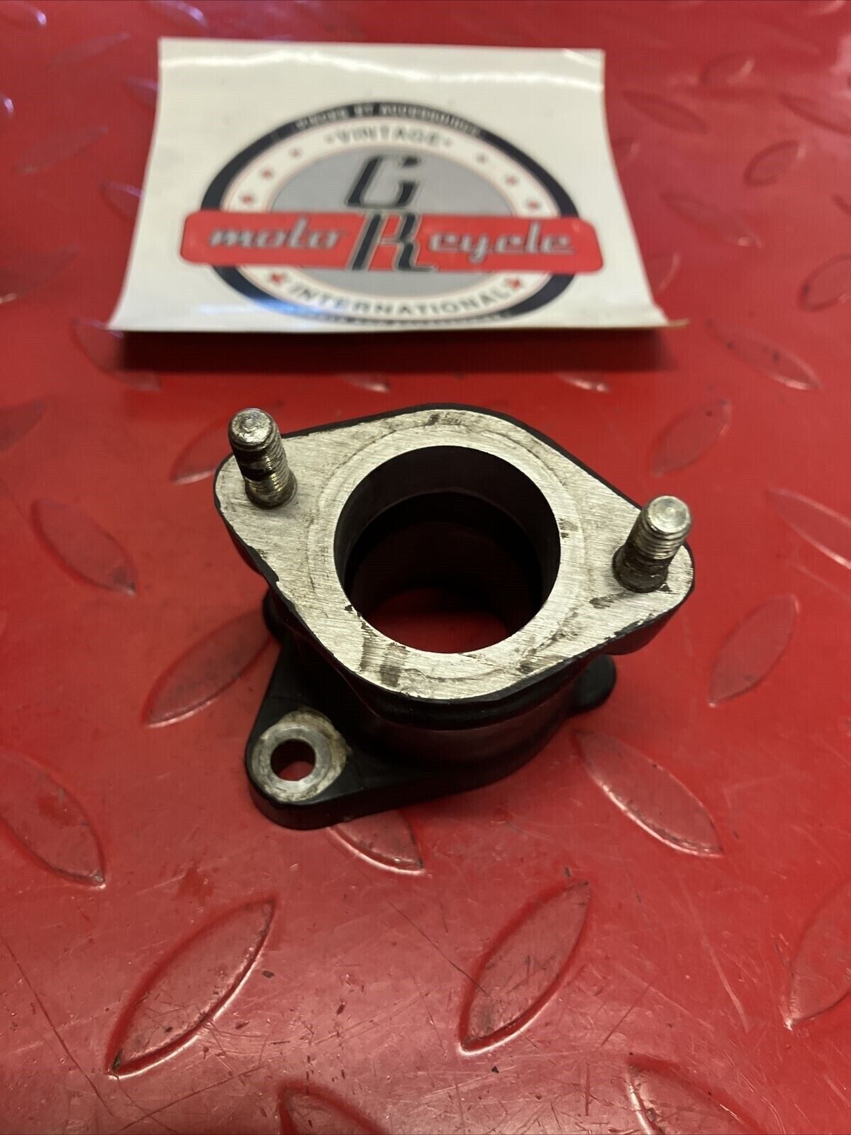 Honda XL200R 1984 Intake manifold carburetor insulator 1983