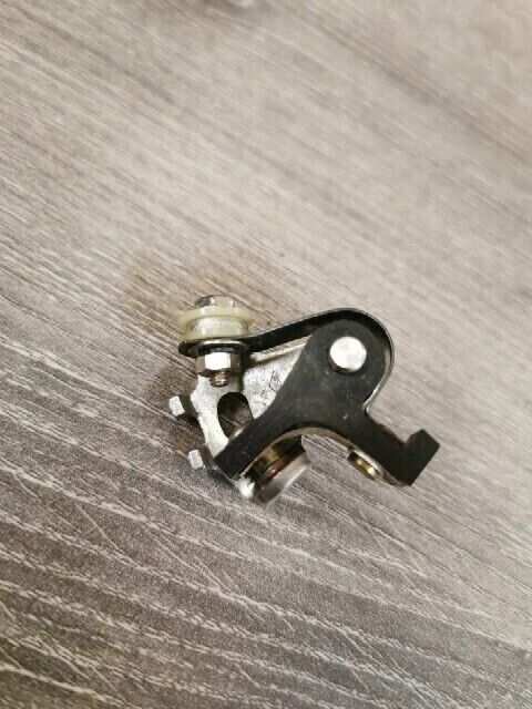 NOS FEW HONDA C100 C105  POINTS ARM 30202-001-095 J60