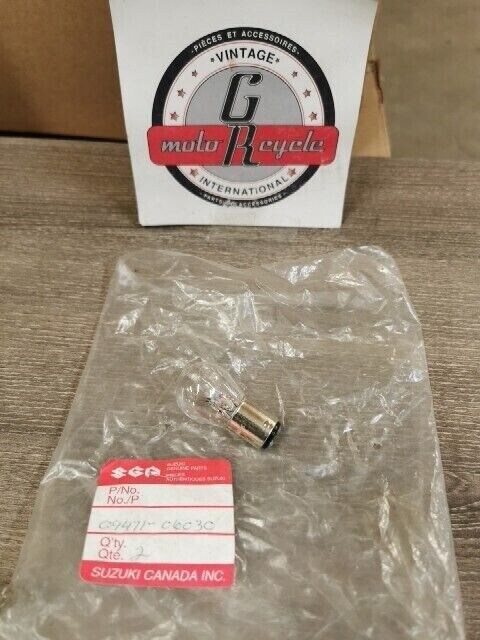 NOS SUZUKI A100 DR400S DR500S GN400T RV125 TAILLIGHT BULB 09471-06030 S42