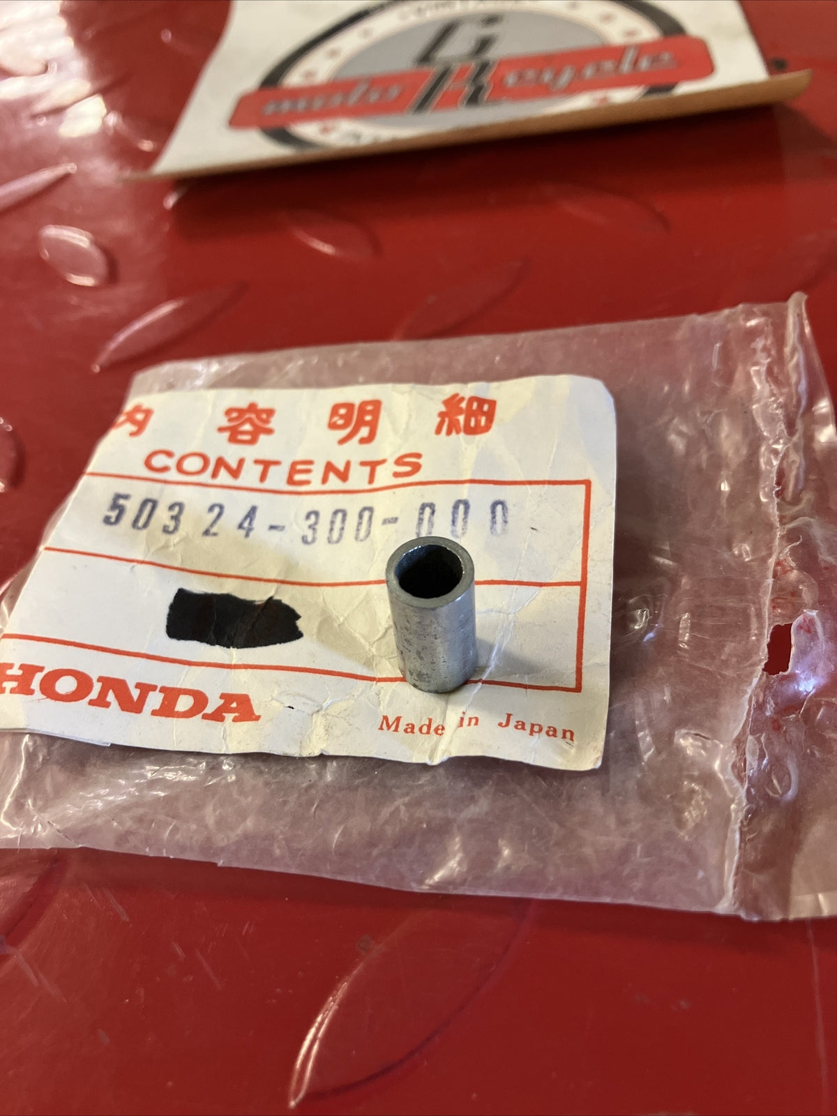 NEW NOS HONDA CB750 COLLAR BATTERY BOX 50324-300-000 H24