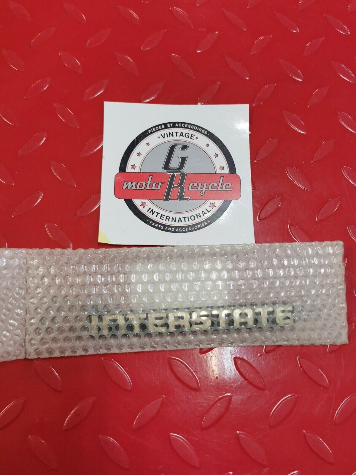 NOS Honda GL1100I A GOLD WING SADDLEBAG (INTERSTATE) EMBLEM 87111-463-770 H10