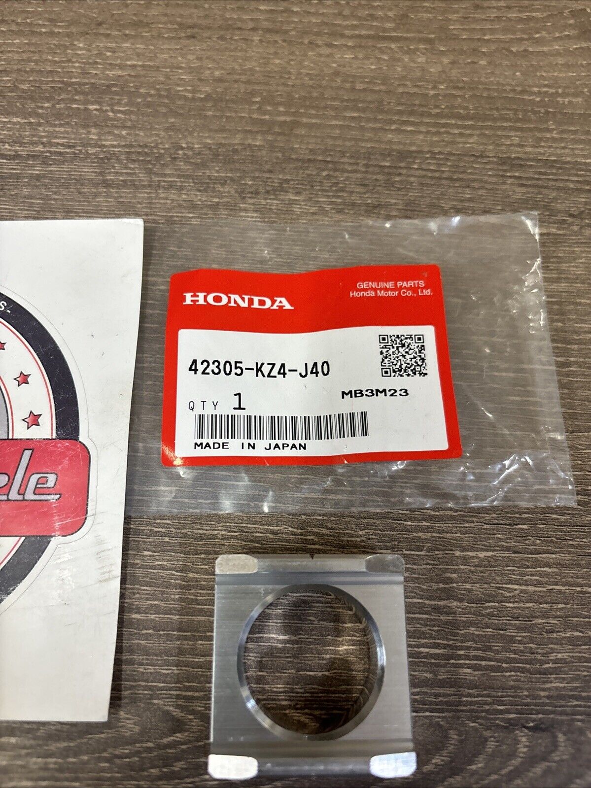 NOS Honda CR125R CR250R CRF250R CRF250X LEFT REAR AXLE COLLAR 42305-KZ4-J40 H138