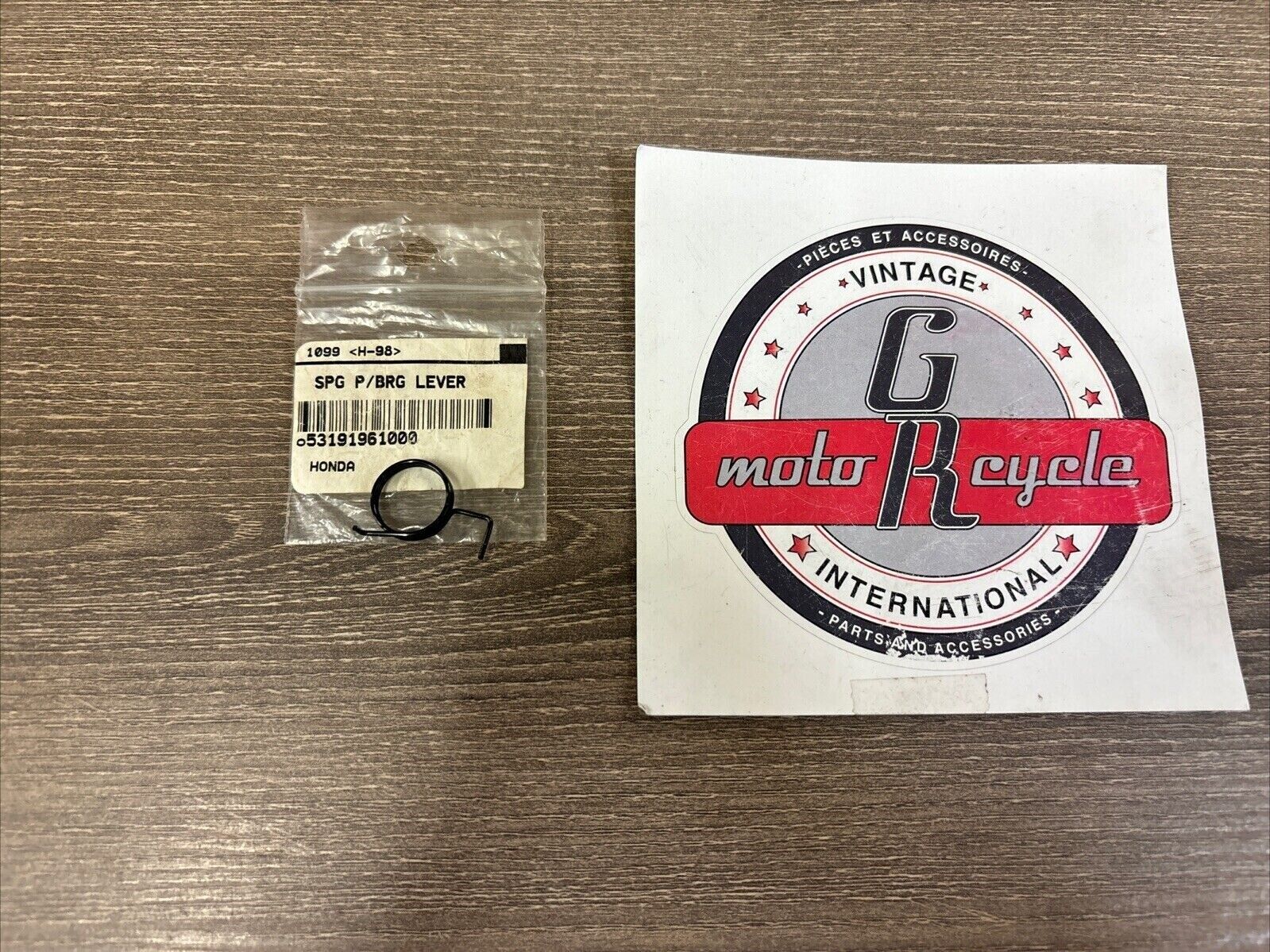 NOS Honda ATC110 ATC200E PARKING BRAKE CONTROL LEVER SPRING 53191-961-000 H124
