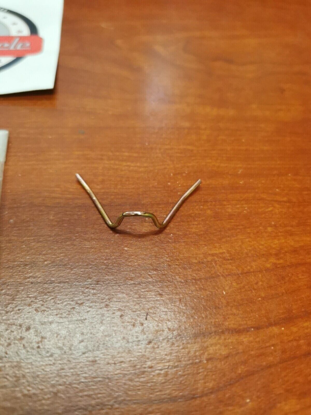 NOS Yamaha REFLECTOR SPRING 148-84324-00-00 Y68