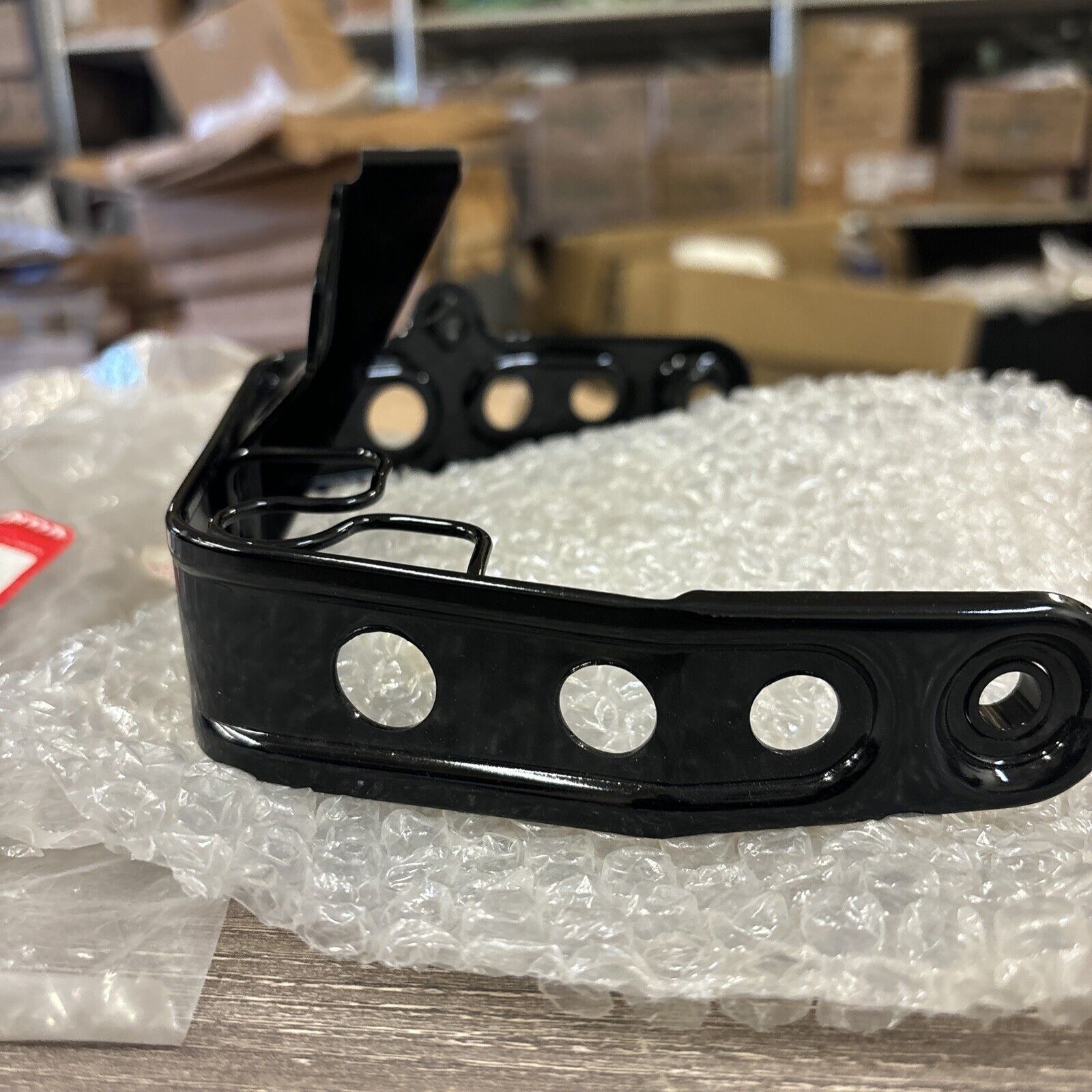 NOS Honda 1986 - 1987 TRX200SX HEADLIGHT BRACKET 61311-HB3-770 H114