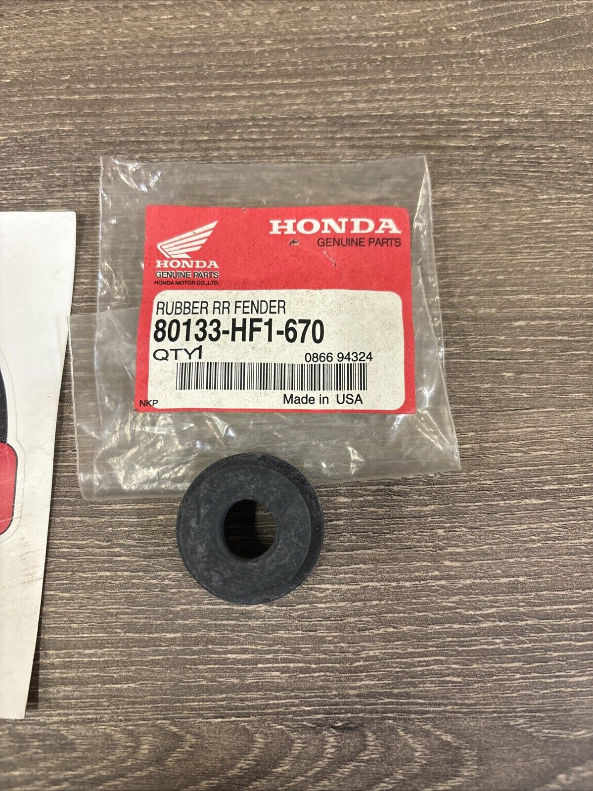 NOS Honda TRX200 D REAR FENDER RUBBER 80133-HF1-670 H134