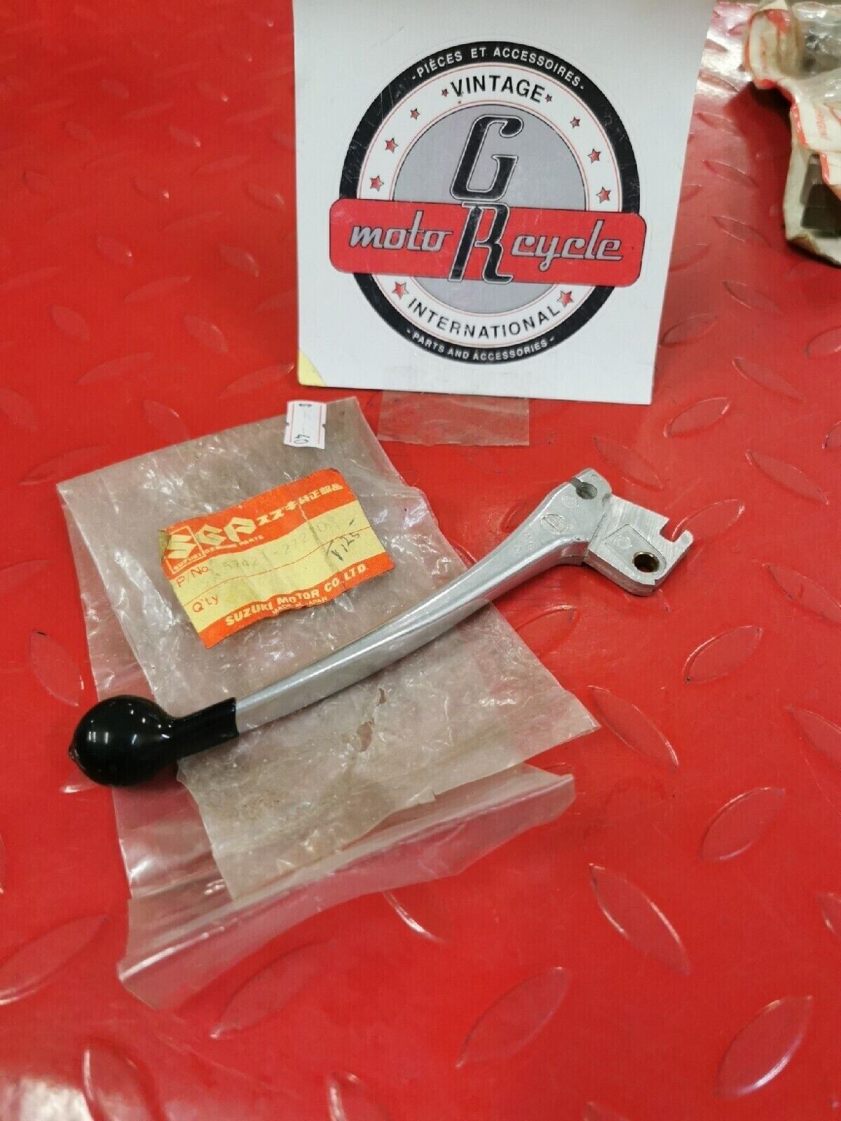 NOS SUZUKI  TS50  1971 - 1974   57421-27210 SUB BY 57421-27212   S12