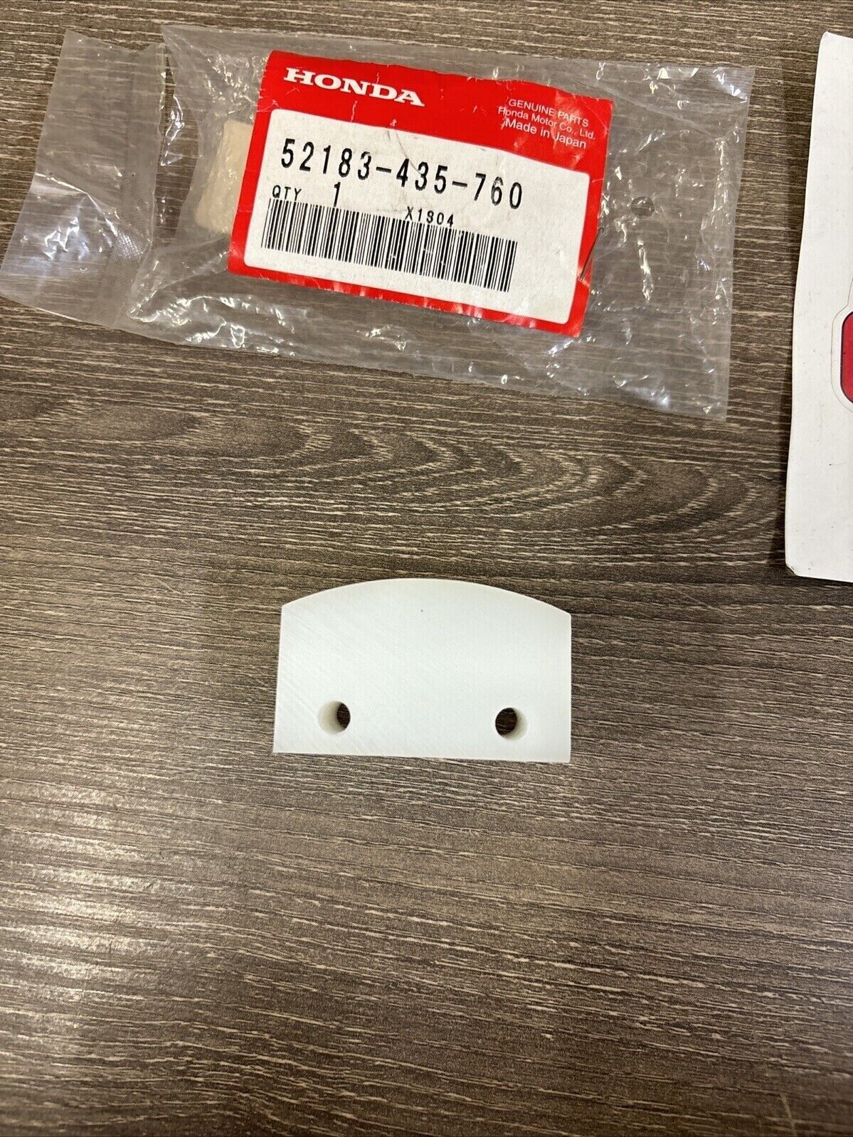 NOS Honda XL185FM XL185S XL200FM XL250S TENSIONER SLIPPER 52183-435-760 H123