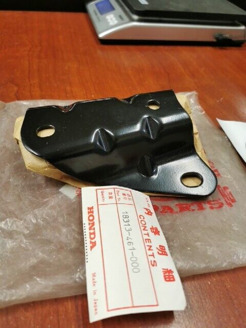 NOS Honda 1980 - 1982 CB900C LEFT MUFFLER BRACKET 18313-461-000 H69