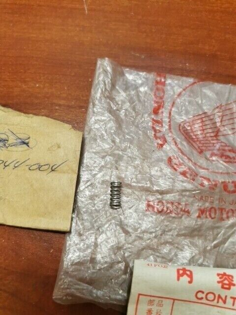 NOS Honda SCREW SPRING 16050-344-004 H90