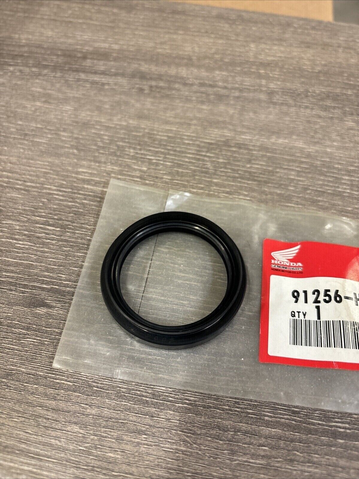 NOS Honda TRX350 TRX350D DUST SEAL 42X54X7 91256-HA7-771 H124