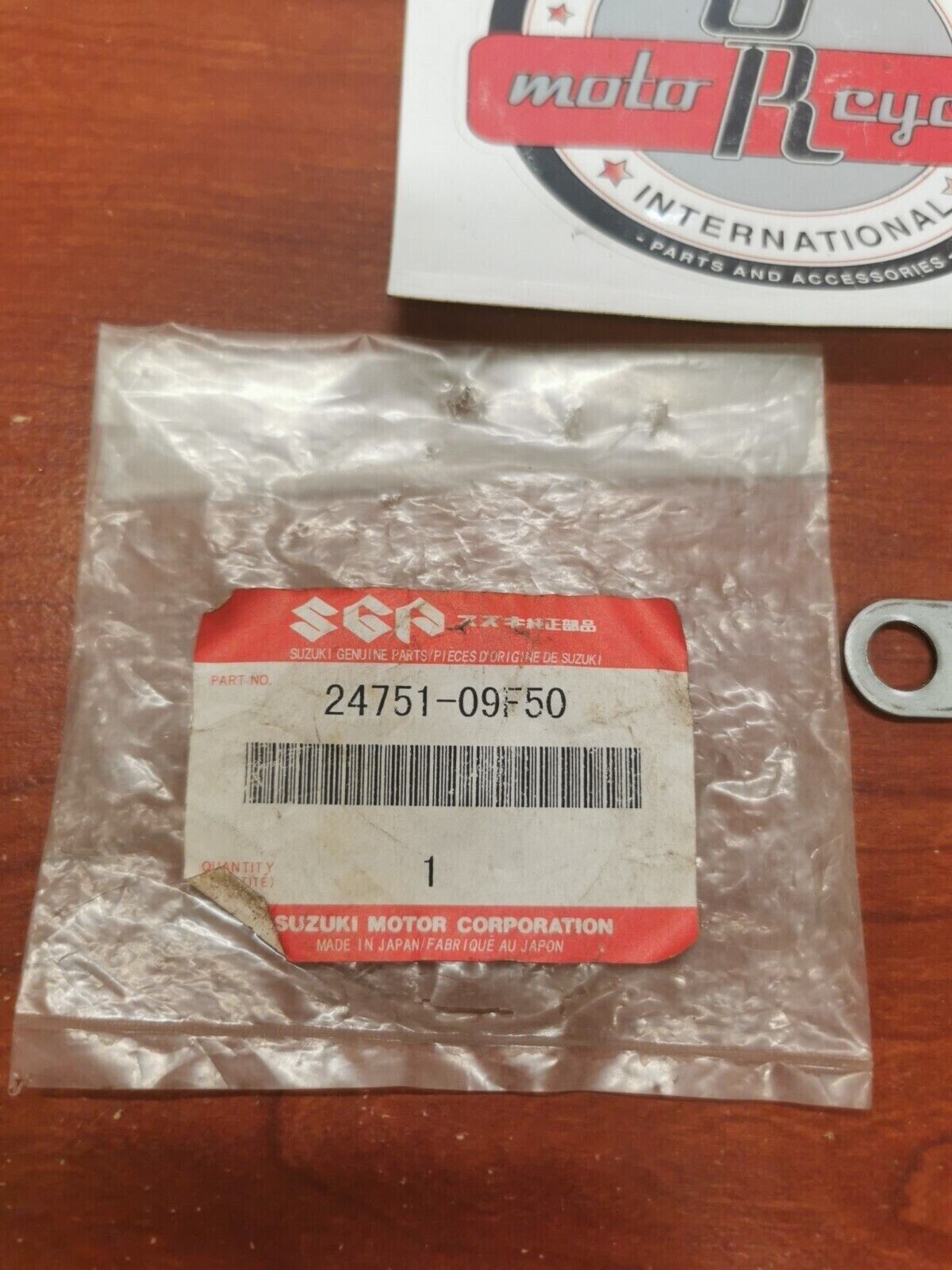 NOS Suzuki LT-A500F (Y,K1) DRIVE SHAFT BEARING RETAINER 24751-09F50 S20