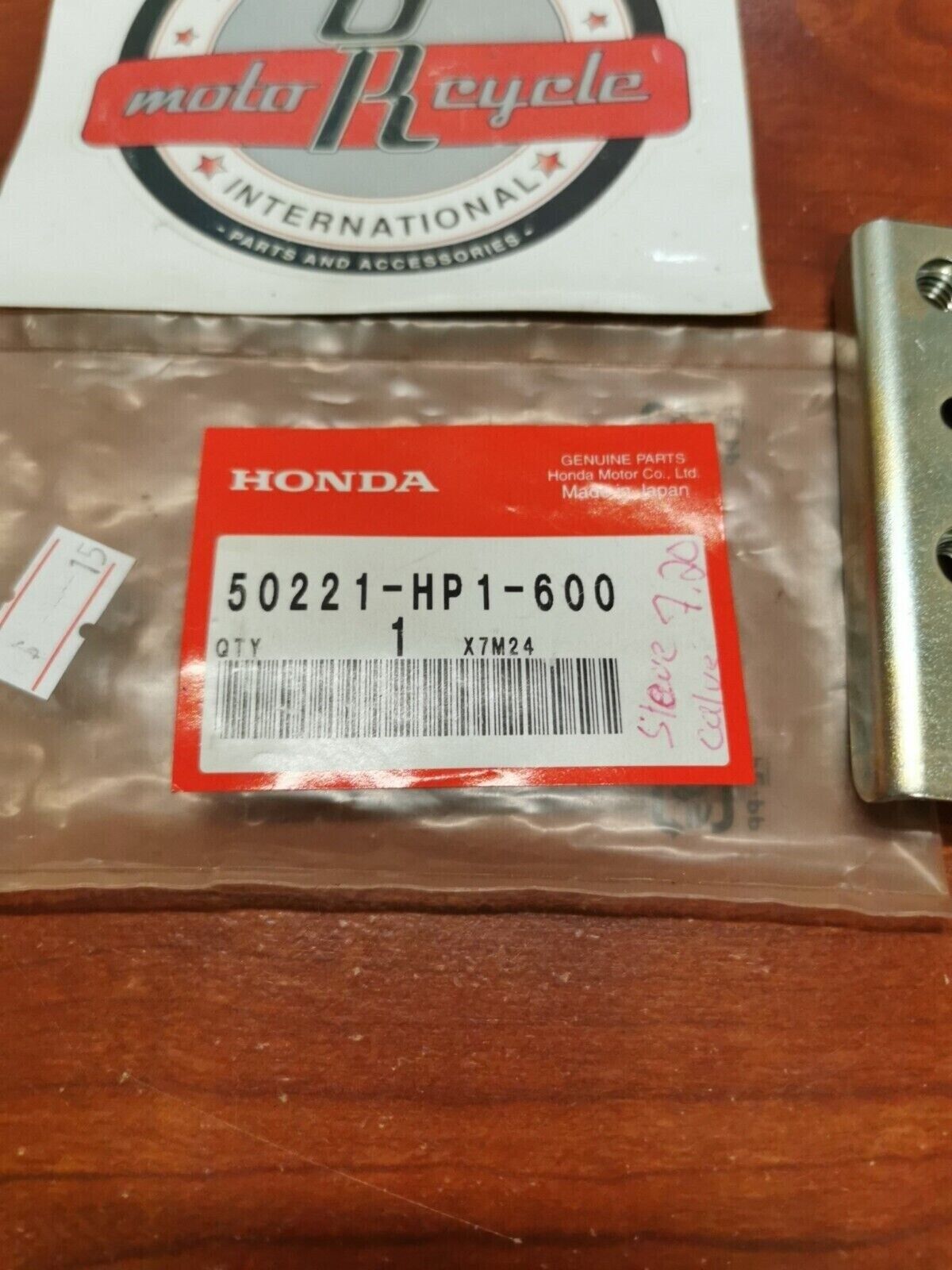 NOS Honda 2006 - 2009 TRX450R 12 - 14 TRX450ER CARRY PIPE STAY 50221-HP1-600 H64