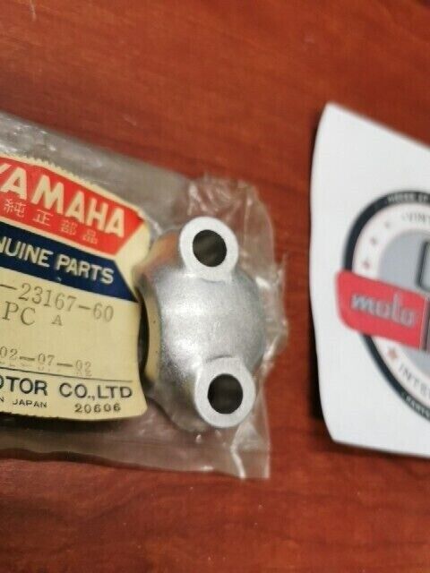 NOS Yamaha RD250 RD350 RD400 TX500 XS2 XS500 AXLE HOLDER 306-23167-60-00 Y129