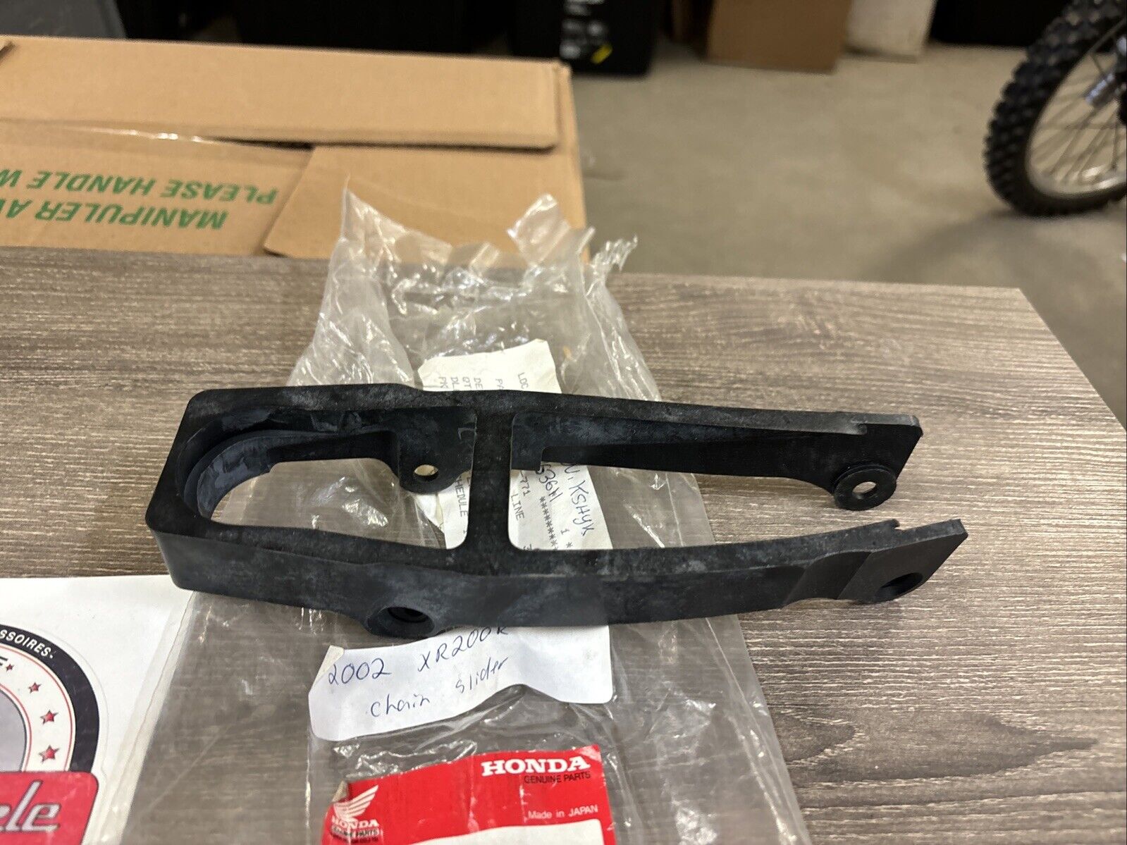 NOS Honda XL250R XL350R XL600 XR200R XR250R CHAIN SLIDER 52170-KK0-771 H137