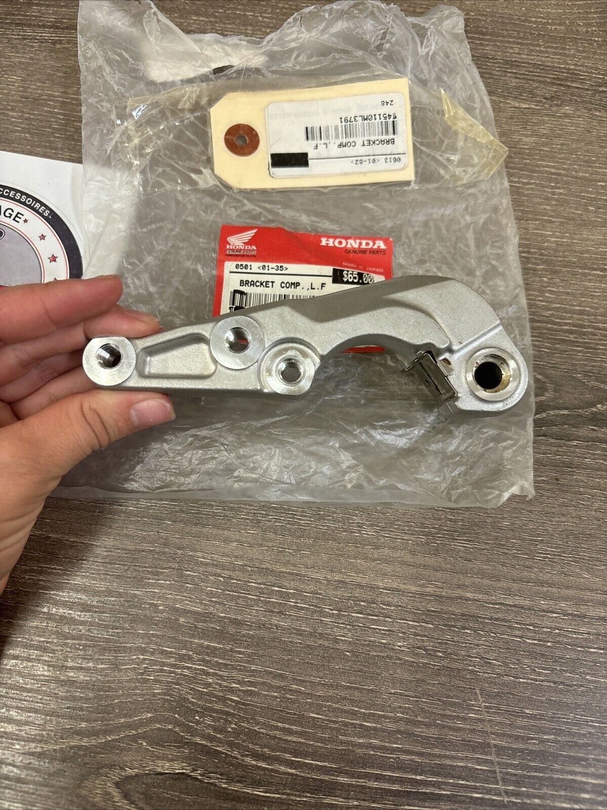 NOS Honda CR125R CR250R CR500R LEFT FRONT BRACKET 45110-KZ3-026 H120