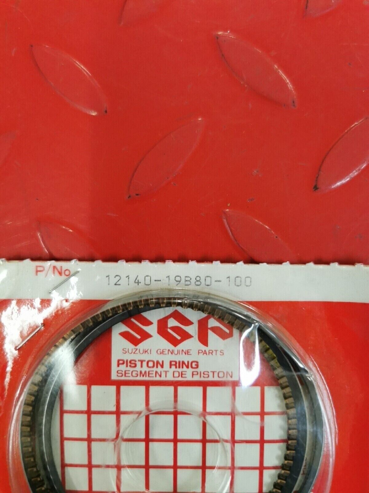 NOS SUZUKI PISTON RING SET OS 1.0 12140-19B80-100 S11