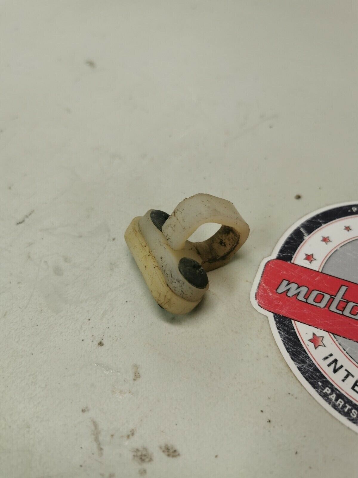 Suzuki RM125 1991 rear brake hose guide clamp bracket holder seat 61197-27C00