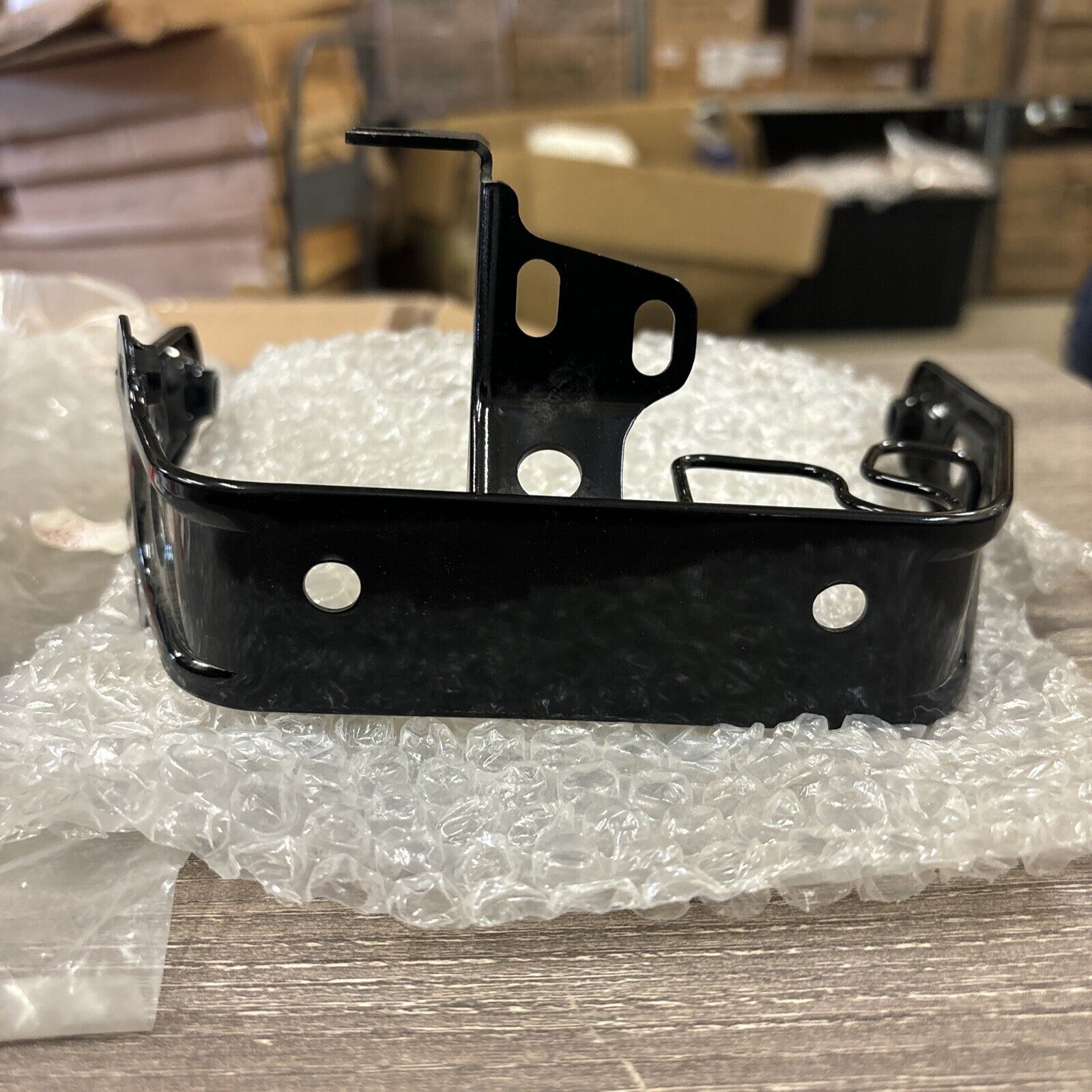 NOS Honda 1986 - 1987 TRX200SX HEADLIGHT BRACKET 61311-HB3-770 H114
