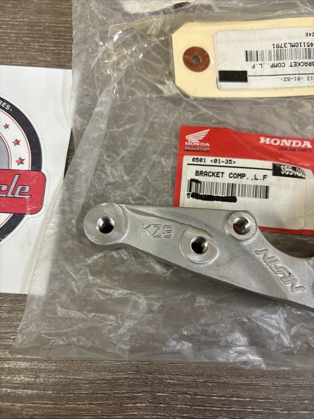 NOS Honda CR125R CR250R CR500R LEFT FRONT BRACKET 45110-KZ3-026 H120