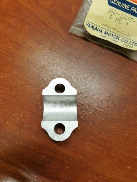 NOS Yamaha RD250 RD350 RD400 TX500 XS2 XS500 AXLE HOLDER 306-23167-60-00 Y129