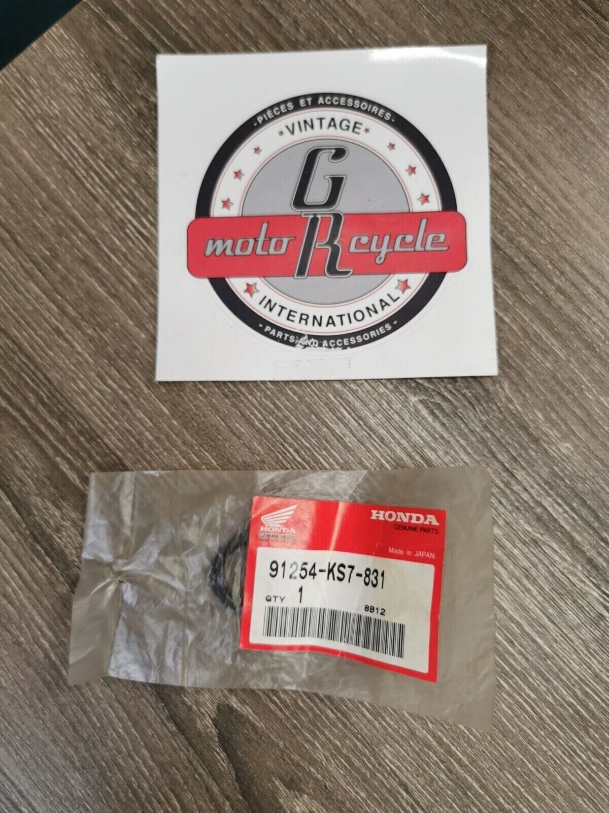 NOS HONDA DUST SEAL91254-KS7-831  H56