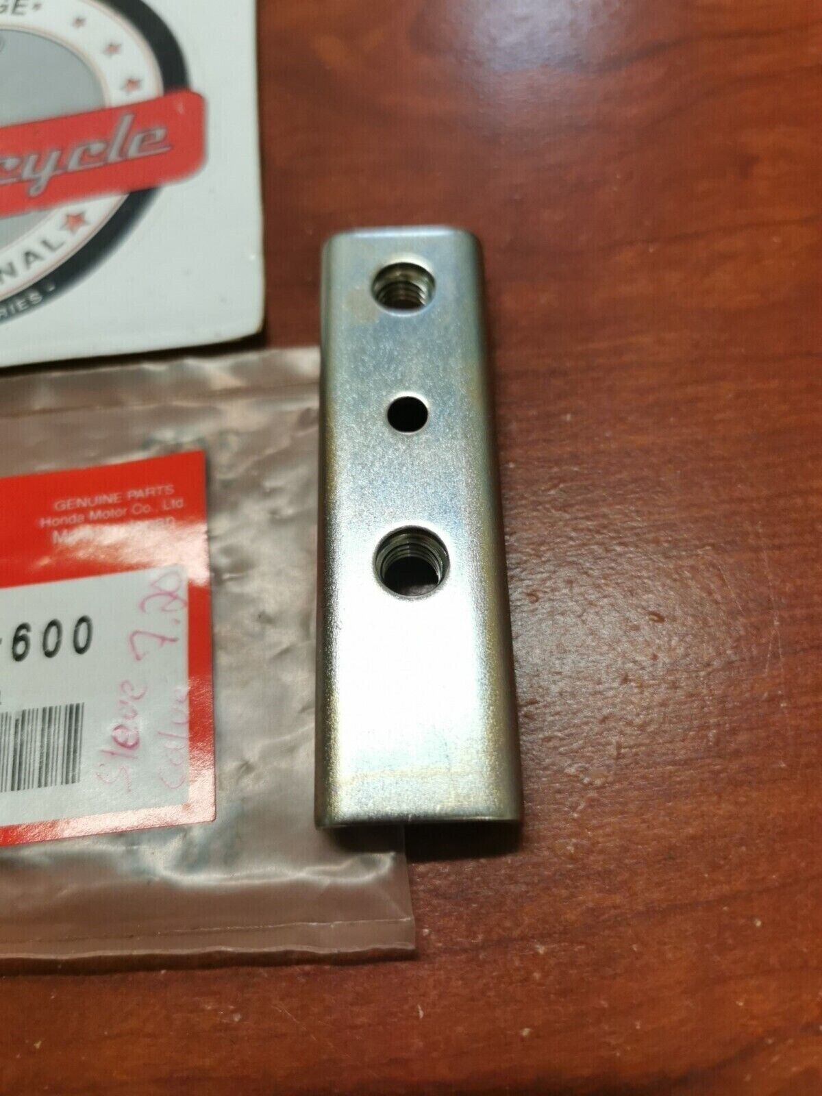 NOS Honda 2006 - 2009 TRX450R 12 - 14 TRX450ER CARRY PIPE STAY 50221-HP1-600 H64