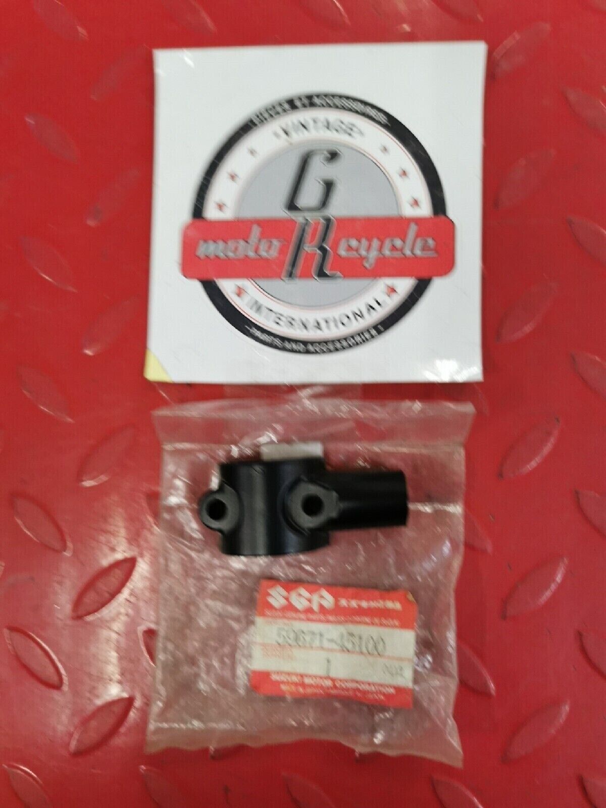 NOS SUZUKI MASTER CYLINDER HOLDER 59671-45100 S11