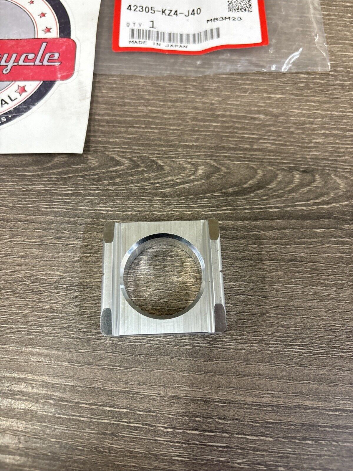 NOS Honda CR125R CR250R CRF250R CRF250X LEFT REAR AXLE COLLAR 42305-KZ4-J40 H138