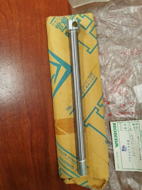 NOS Honda C100 FRONT WHEEL AXLE C100-5426 SUB. 44301-001-000 H68