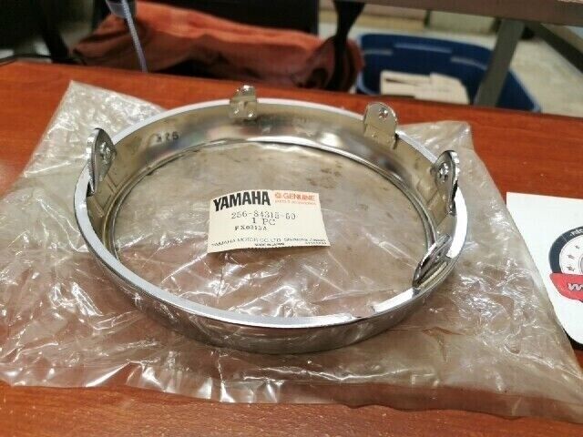 NOS Yamaha TX650 XS1 XS2 HEAD LAMP RIM 256-84315-60-00 Y130