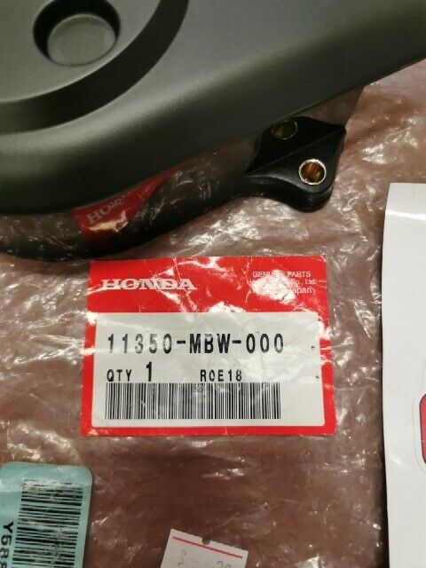 NOS Honda 1999 - 2006 CBR600F LEFT REAR SPROCKET COVER 11350-MBW-000 H108