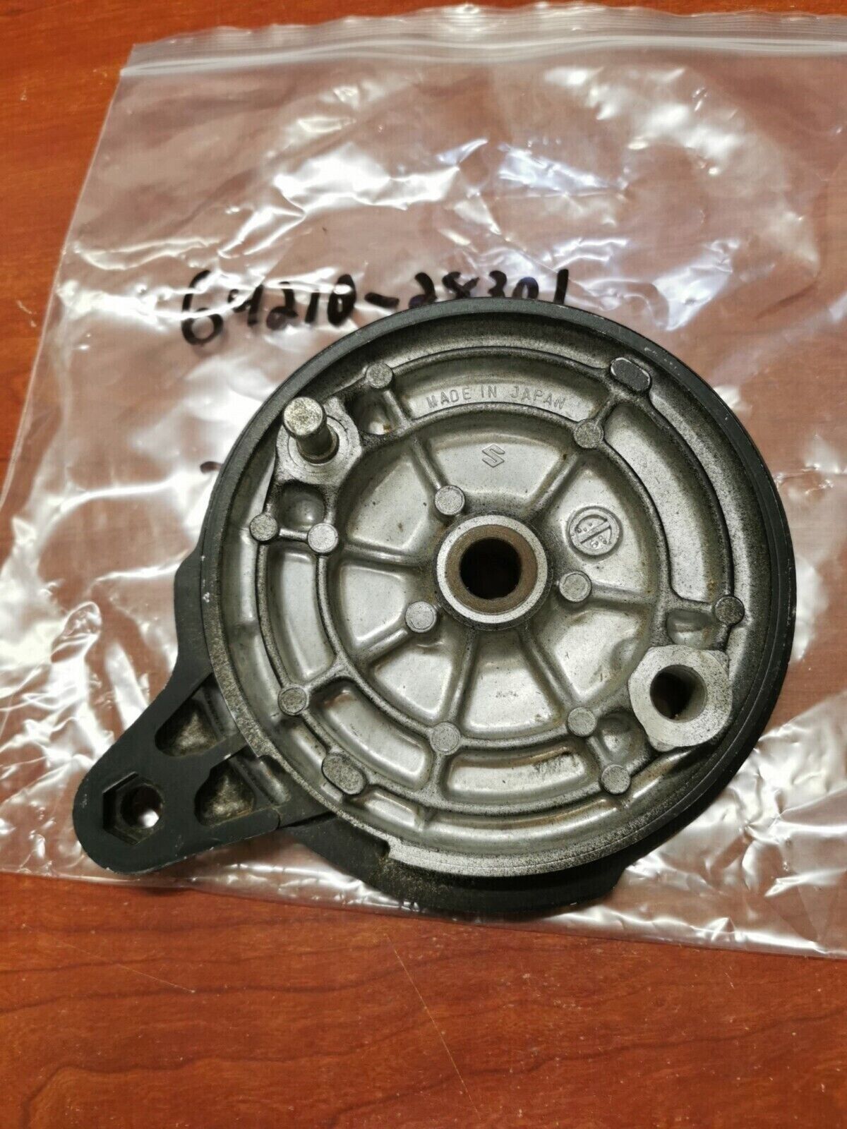 NOS SUZUKI 1973 - 1975 TM125 REAR HUB PANEL 64210-28301 SUB. 64210-28302 S30