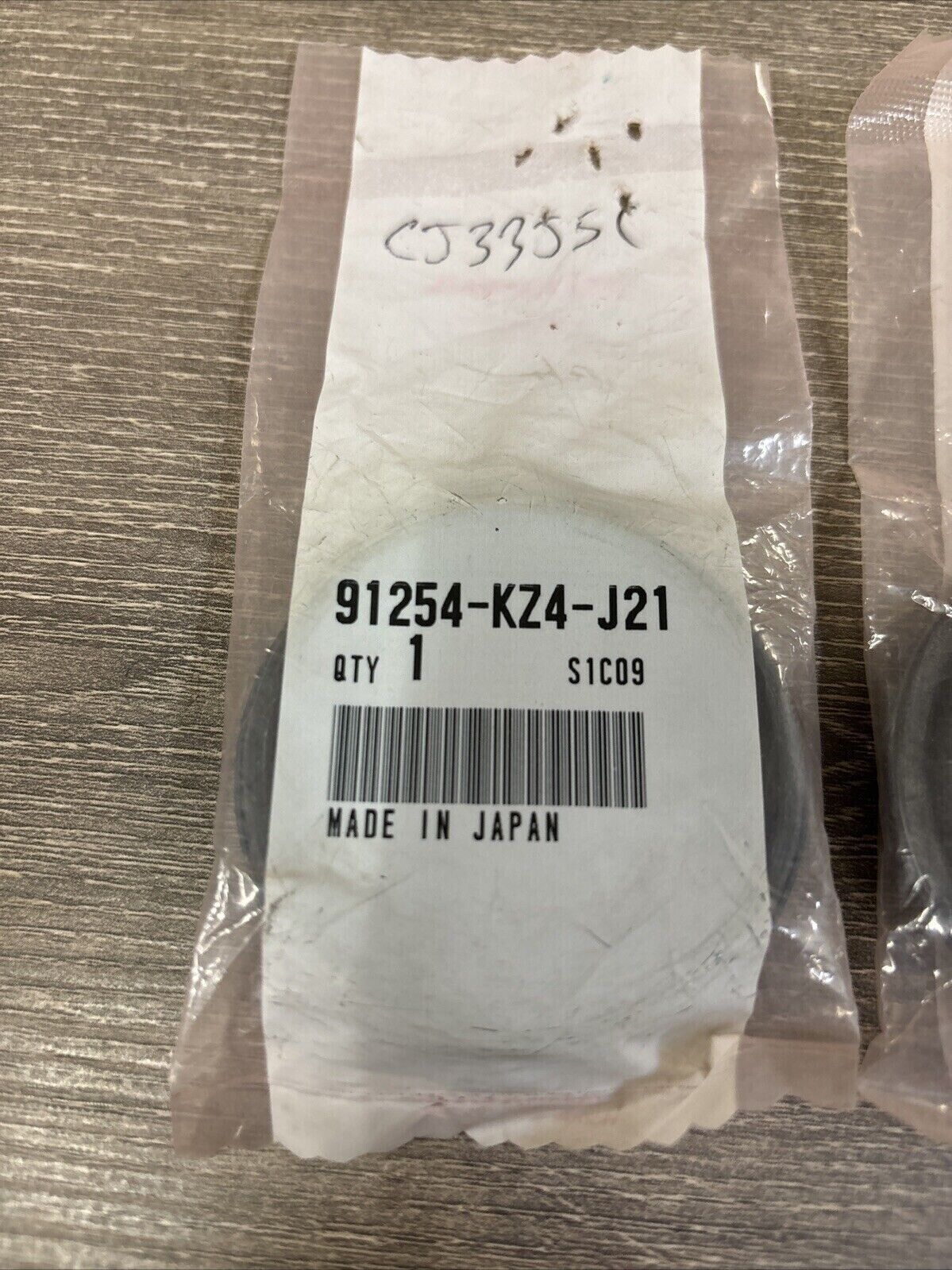 NOS Honda 1998 2000 - 2007 CR125 R DUST SEAL KIT OF 2 91254-KZ4-J21 SUB H126
