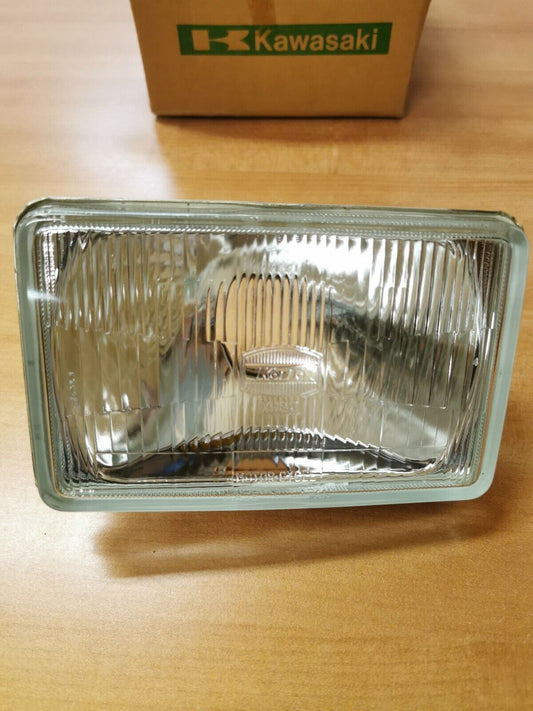 NOS KAWASAKI KLF300 HEADLIGHT LENS 23007-1138 K6